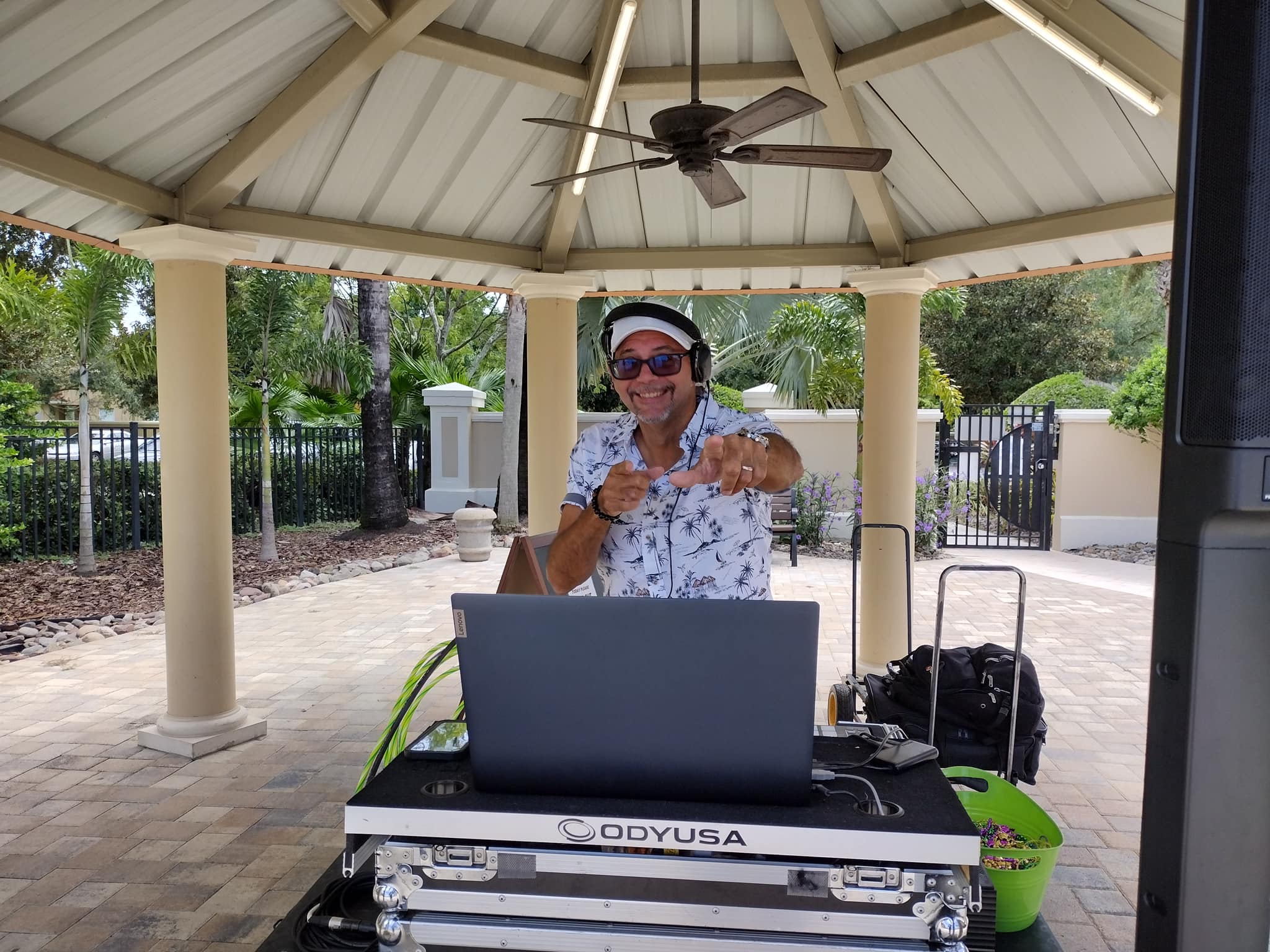A DJ providing poolside entertainment at Windsor Hills Resort