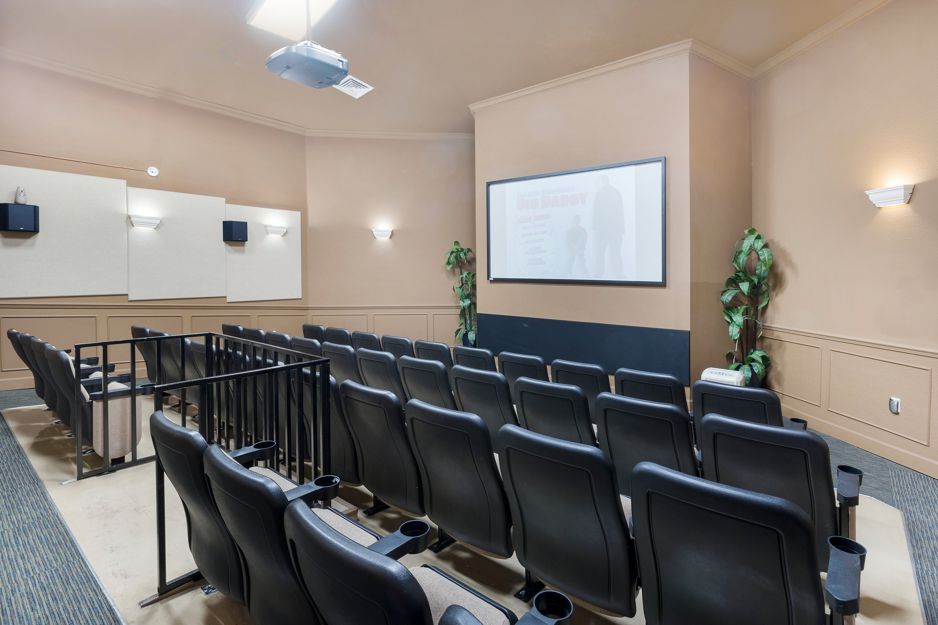 Movie theater room with reclining seats at the Windsor Hills clubhouse