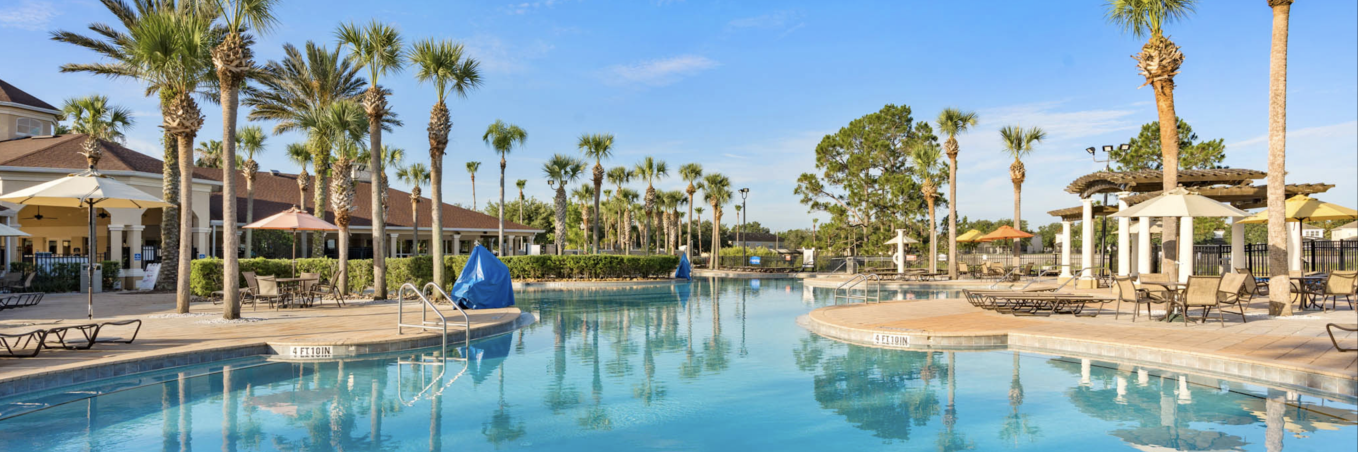 Windsor Hills Resort main pool surrounded by palm trees