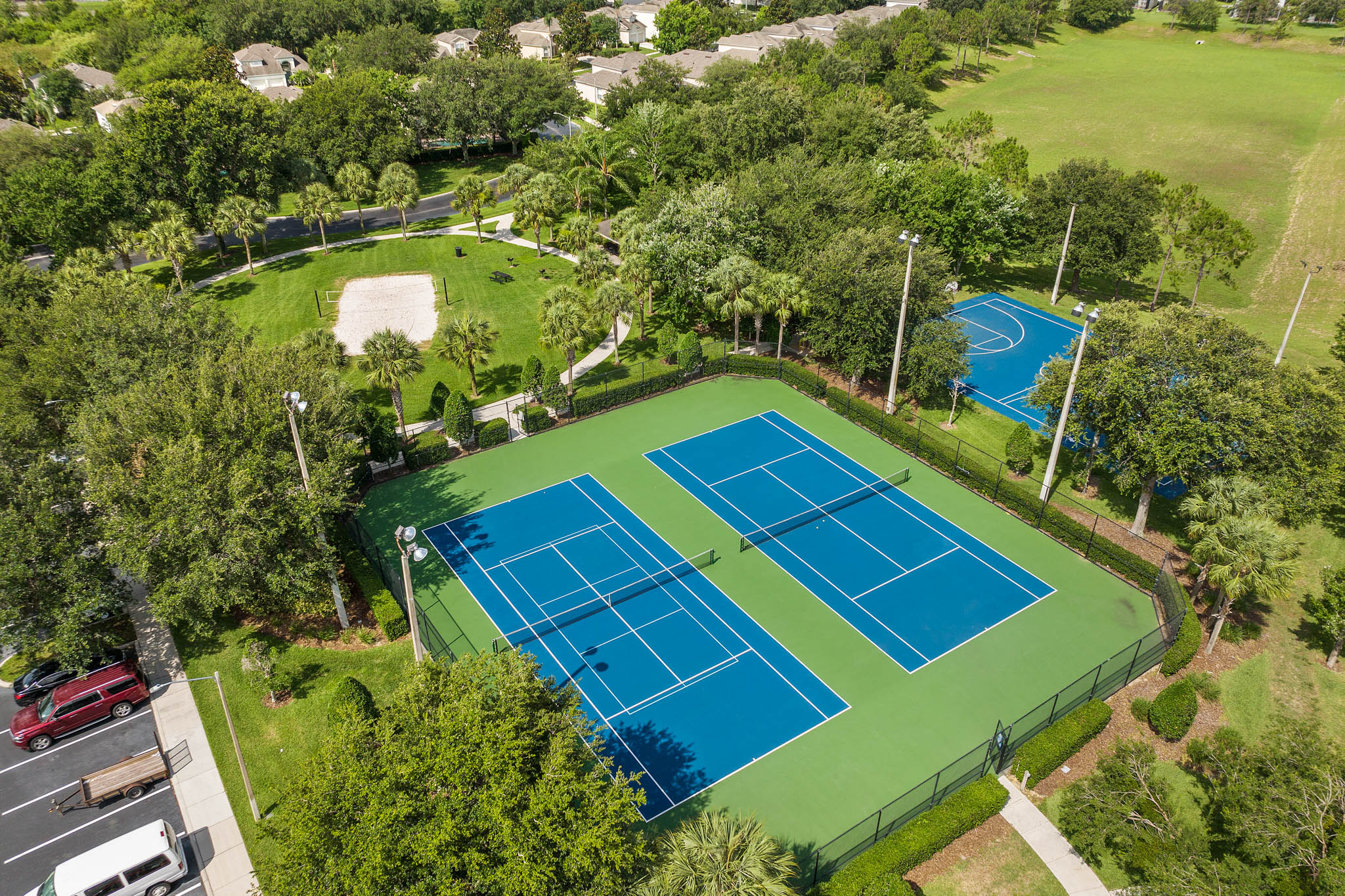 Tennis, pickleball, basketball and sand volleyball courts at the Windsor Hills sports complex