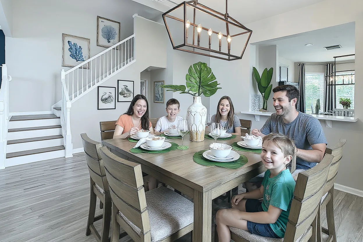 An ordinary family of five sitting at the existing dining table sharing a spaghetti dinner, two parents and three kids in plain t-shirts, everyone