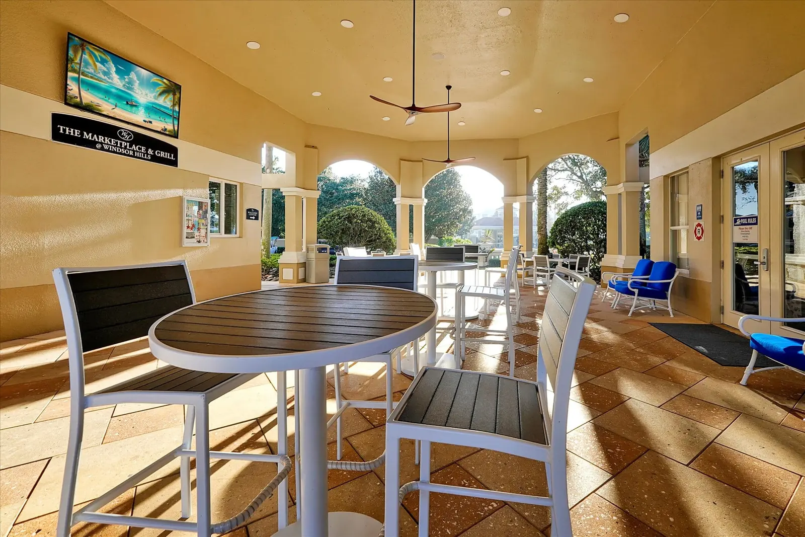 Dining tables on the Windsor Hills Resort clubhouse patio