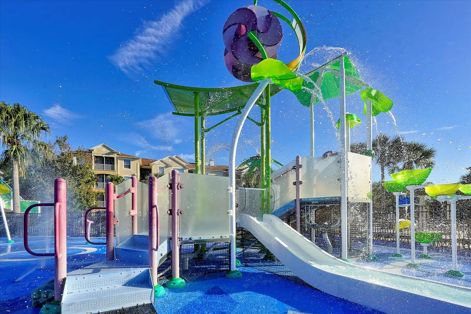 The Windsor Hills Resort splash pad with condo buildings behind